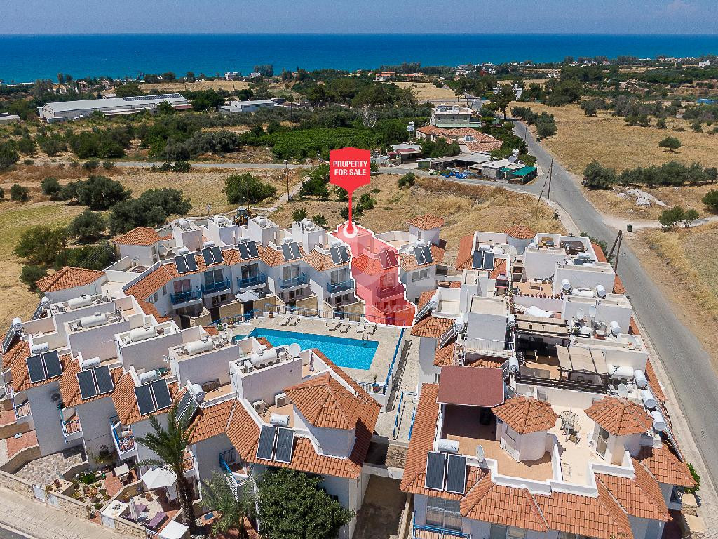 A two-bedroom house for sale in Argaka, Paphos with verandas, rooftop terrace, and excellent potential for permanent living, holidays, or rental investment.