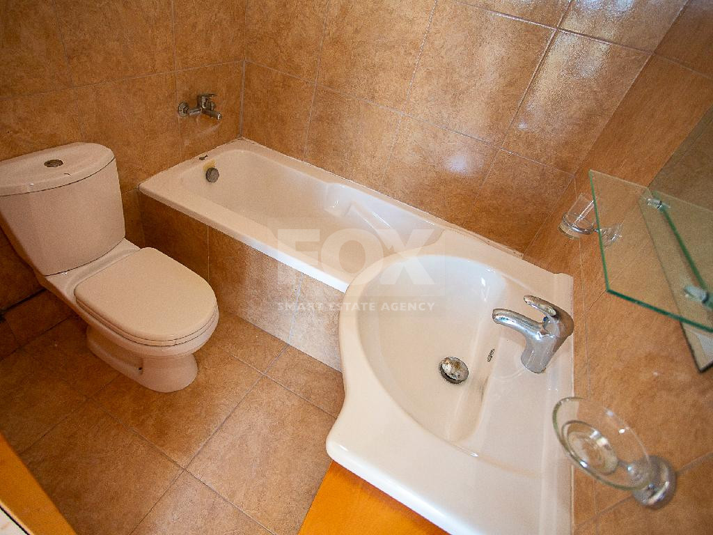 A two-bedroom house for sale in Argaka, Paphos with verandas, rooftop terrace, and excellent potential for permanent living, holidays, or rental investment.
