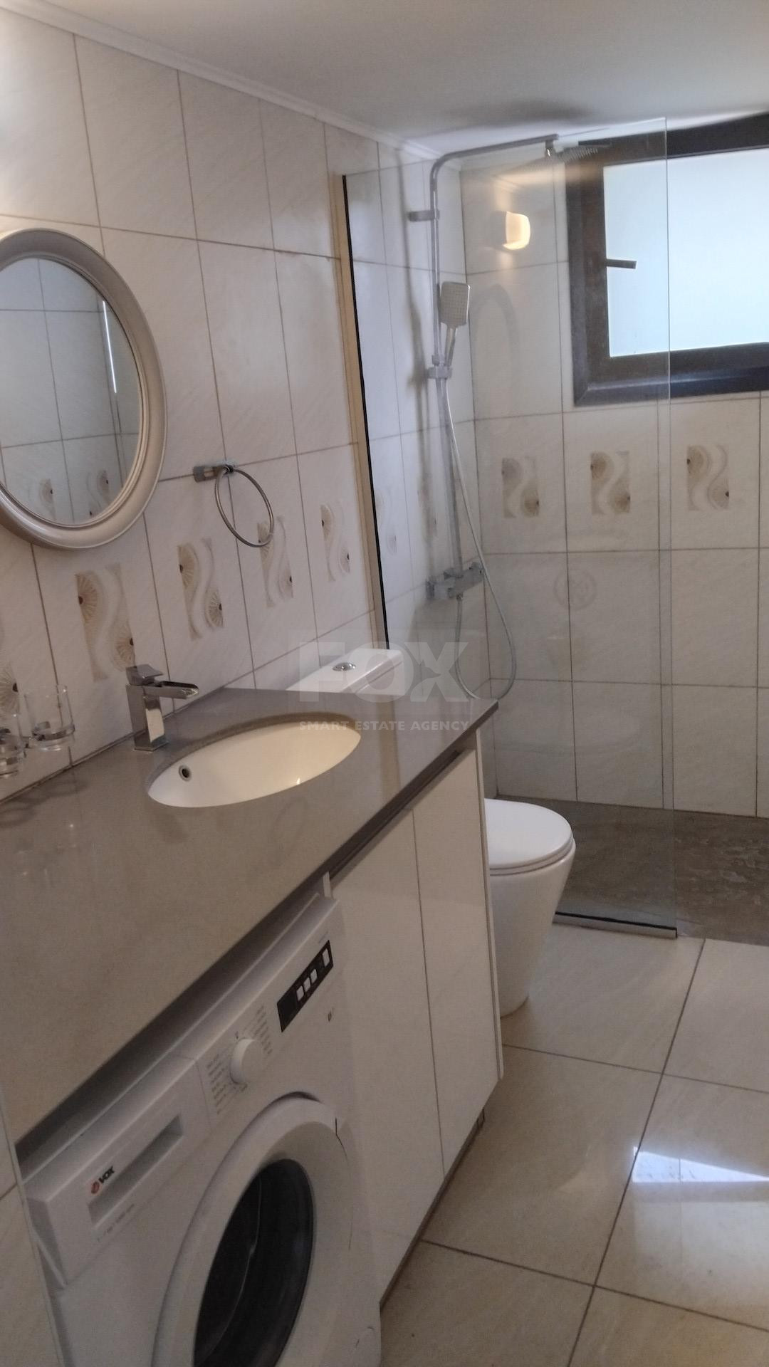 For Sale Two -Bed Renovated Apartment in Kato Pafos with title deeds.