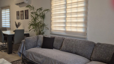 Charming Two-Bed Semi-Detached House in Universal with City Views