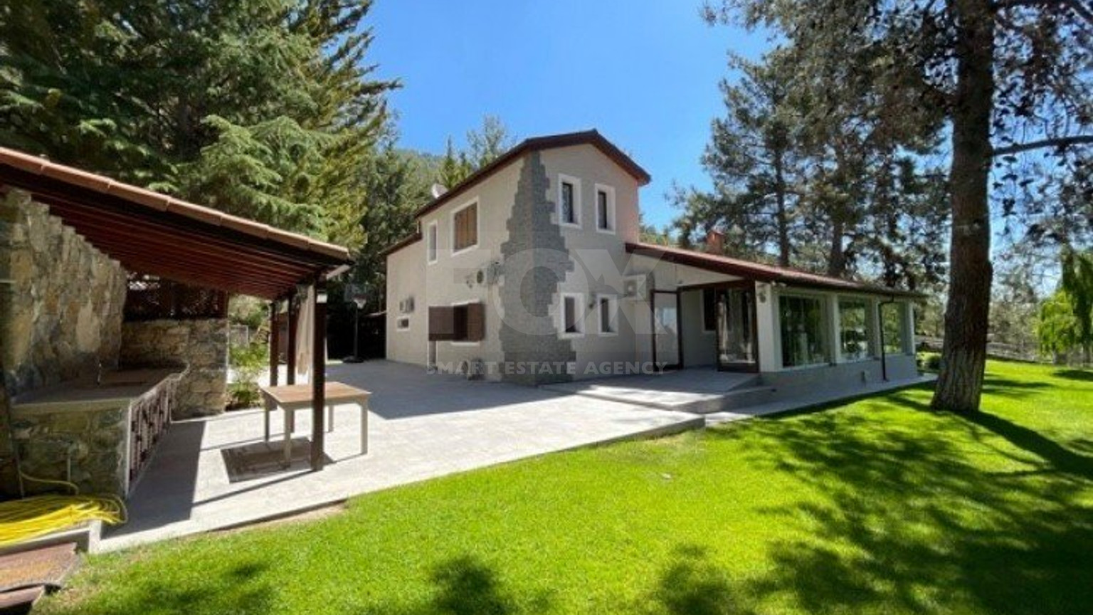 Luxury Viila with guest house in Moniatis with its own private grounds of landscaped gardens engulfed by forest trees.
