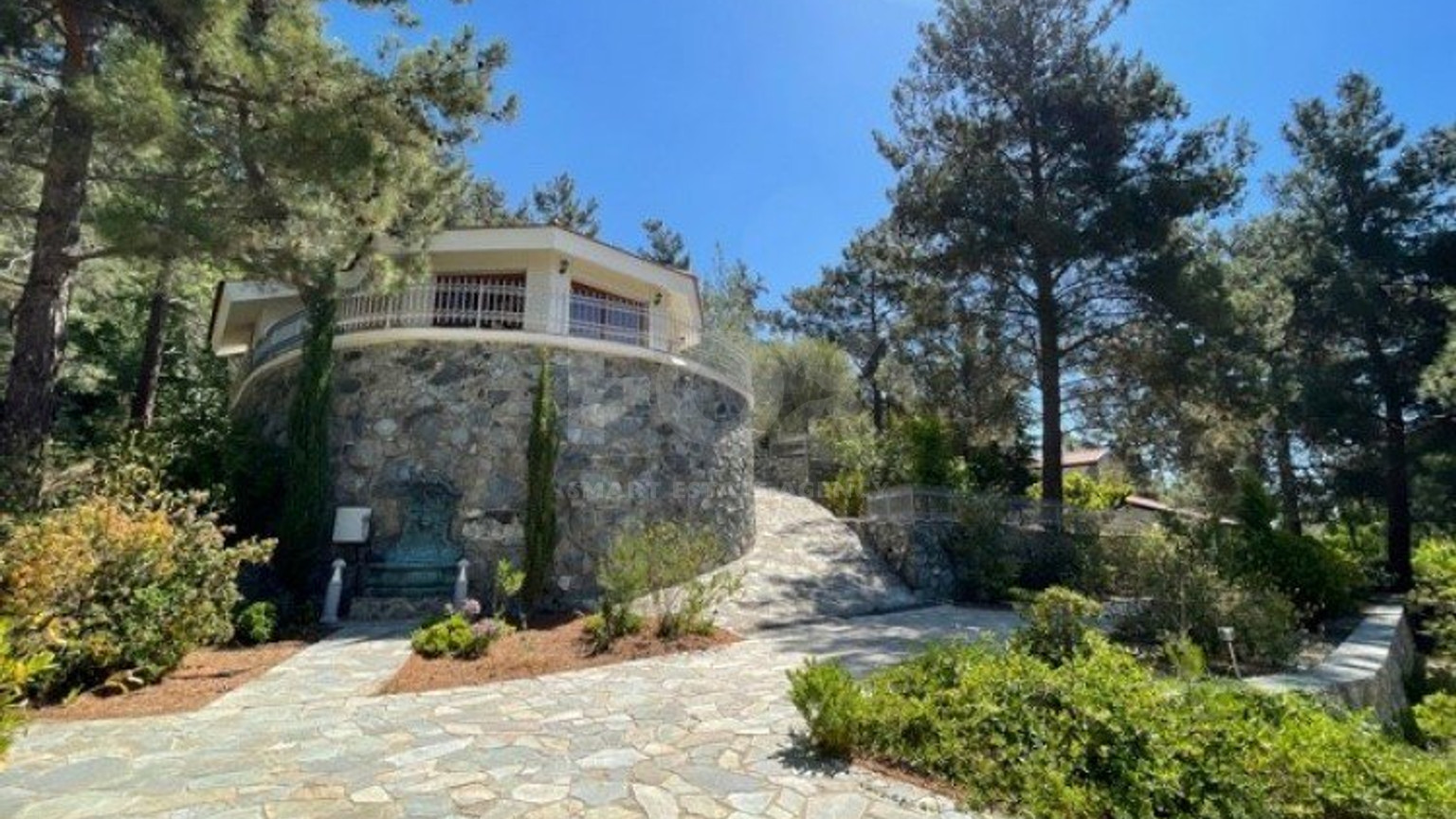Luxury Viila with guest house in Moniatis with its own private grounds of landscaped gardens engulfed by forest trees.