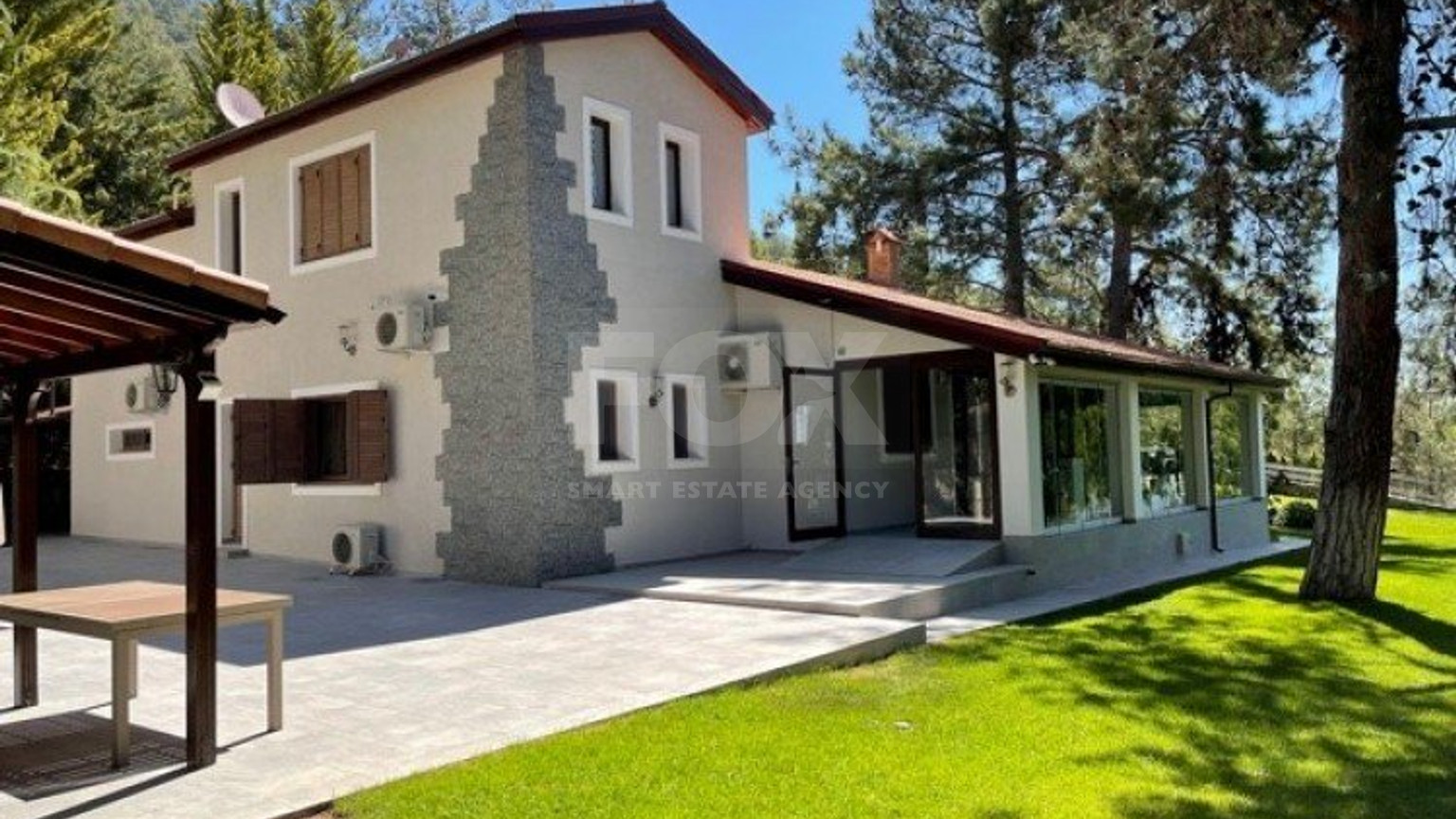 Luxury Viila with guest house in Moniatis with its own private grounds of landscaped gardens engulfed by forest trees.