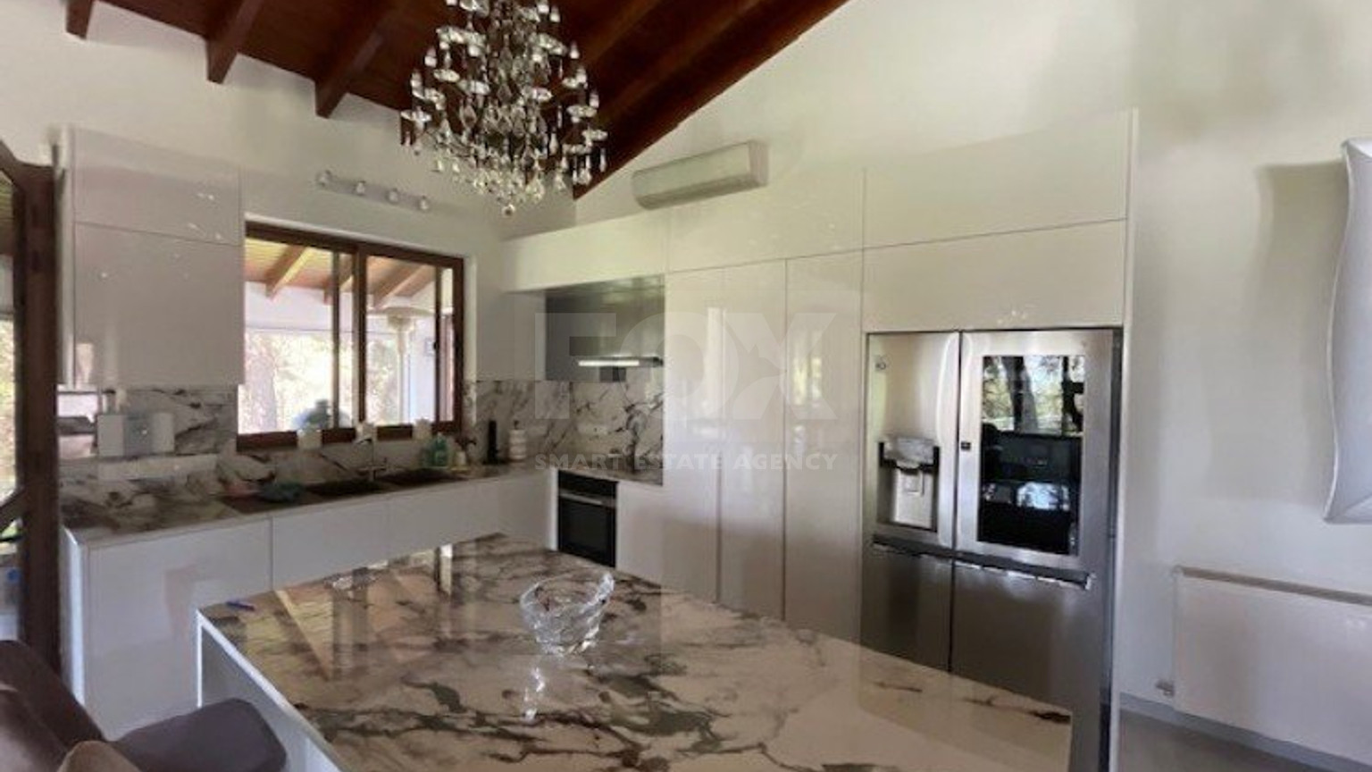 Luxury Viila with guest house in Moniatis with its own private grounds of landscaped gardens engulfed by forest trees.