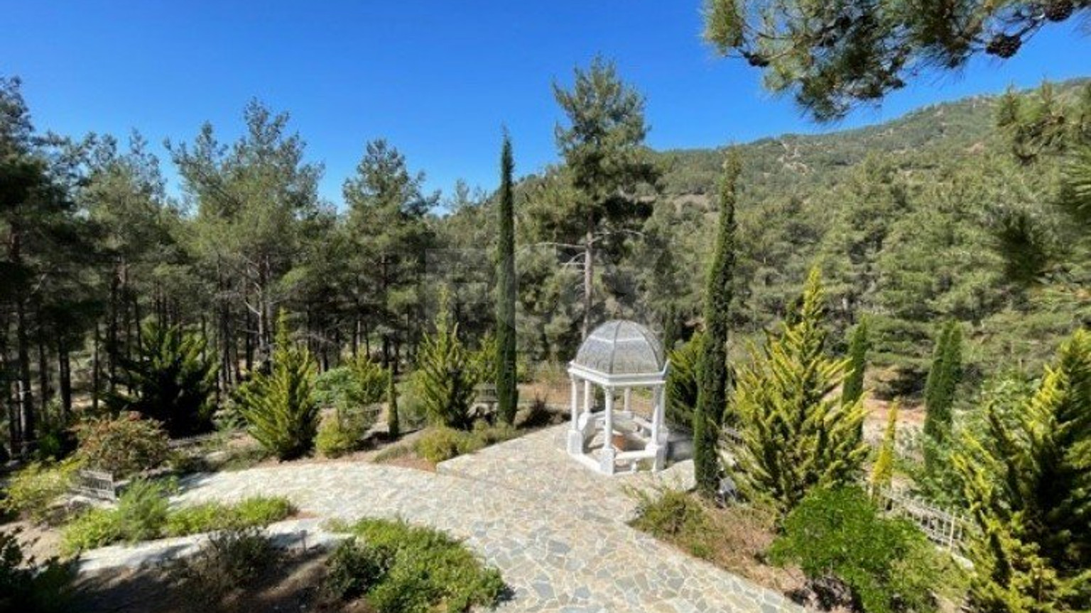 Luxury Viila with guest house in Moniatis with its own private grounds of landscaped gardens engulfed by forest trees.