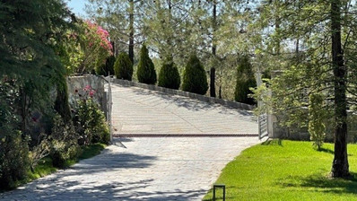 Luxury Viila with guest house in Moniatis with its own private grounds of landscaped gardens engulfed by forest trees.
