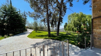 Luxury Viila with guest house in Moniatis with its own private grounds of landscaped gardens engulfed by forest trees.