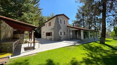 Luxury Viila with guest house in Moniatis with its own private grounds of landscaped gardens engulfed by forest trees.