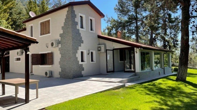 Luxury Viila with guest house in Moniatis with its own private grounds of landscaped gardens engulfed by forest trees.