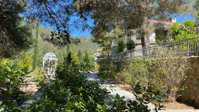 Luxury Viila with guest house in Moniatis with its own private grounds of landscaped gardens engulfed by forest trees.