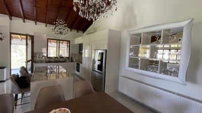 Luxury Viila with guest house in Moniatis with its own private grounds of landscaped gardens engulfed by forest trees.